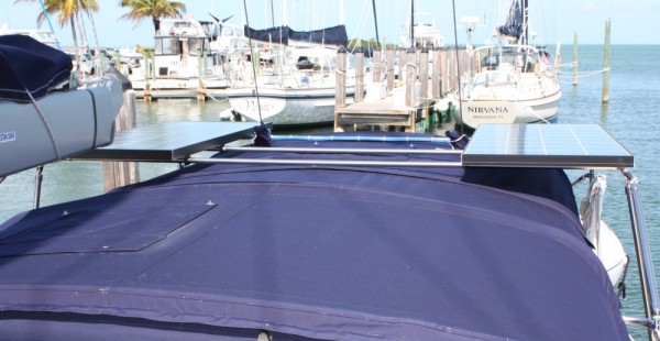 Here is a view of both panels.  Note they are mounted on the outside of the back stays which keeps the window above the helm with clear view of the sail and wind instruments.