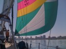 The spinnaker is flying and that is Milwaukee in the back ground. Light air but we were able to keep moving with the big chute.
