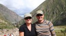 K & J sitting atop the Incan ruins at Ollantaytambo with a view of the town and valley behind us