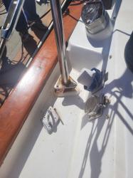 "During".  Foot is welded back in place by and EXPERT welder.: The fix required me to clean the three bold holes, put an epoxy putty in the bottom of the hole, fill the hole and exposed deck core with epoxy resin, sand flat, and redrill the mounting holes.