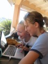 Girls enjoying an internet cafe in St. Kitts.