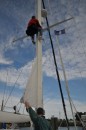 Noel heads up the mast to try to figure out our anchor light problem.