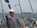 Jim at the helm of Ceol Mor in the Bequia Easter Regatta