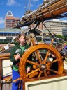 Bubby and Anna at the helm of Pride of Baltimore.
