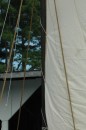 A closer look at how the sail is attached to the mast.