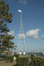 The US Weather Bureau once used Coastal Warning Display towers like this one to fly signal flags that warned mariners of wind shifts or approaching storms. Technological advances made the towers outdated, but the one on Manteo was refurbished in 2005 so the flags could once again fly on the waterfront. It
