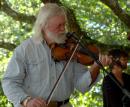 Al McCandless: McCandless played fiddle with The Outliers during the festival.