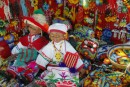 One of the many stands in the central Square selling Huichol artwork.