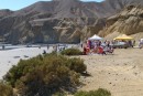 The food and beer tents setup on the shoreline.