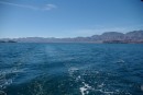 Sailing up the channel between Isla Carmen and Loreto. Isla Danzante is on the left and Puerto Escondido on the right.