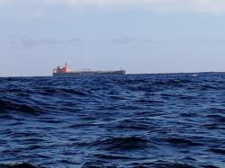 Big ship leading the way out of Fiji: We were overtaken by this big ship as we approached the pass, leaving Fiji