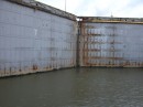 The lock is closed and the water was raised on the other side for the boat to continue the journey to the Pacific
