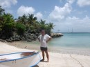 Johan standing at a fold down dinghie and the reef at the back.  Rich fish life at the reef and excellent for snorkeling