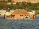 Wow, a floating bar.  How creative can they be?  Maybe we can build a house and live in Tahiti for ever and ever....  