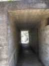 The ammo bunkers were made for poured concrete and local limestone rock.