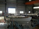 This is the second picture I saw.  Looking at the behemoth in the background my boat did not look that big anymore.  Actually it was the smallest boat in the factory. 