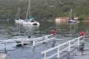 A very high Summer tide swamping the wharf
