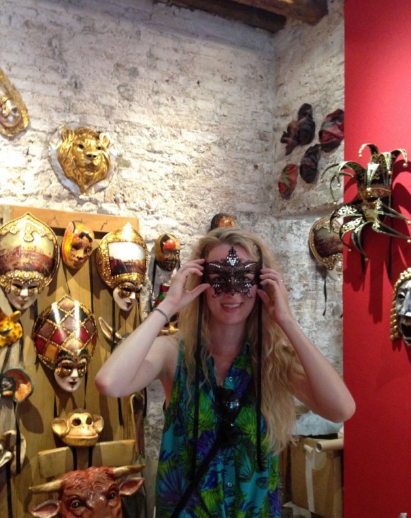 Amy trying on Venice masks