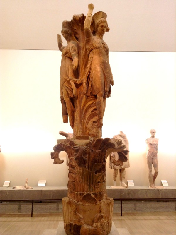 Top part of huge column with three dancing girls about 330 BC