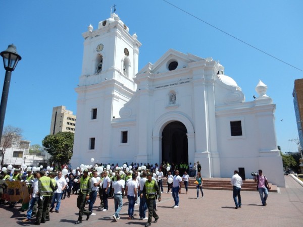 Santa Marta church, lots of police in attendance, not sure what white balloons signified 