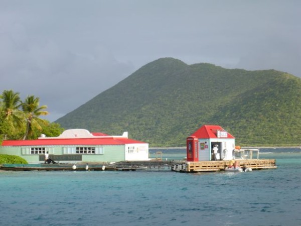 Marina Cay Island dock with Pussers Rum shop and British Telephone kiosk 
