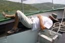 Russ at ease on boat trip back from Kraka