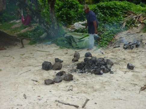 Meanwhile, the fire was burning and the rocks that had been placed on top of it were heating