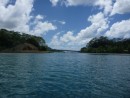 Some of the scenery we saw as we explored the smaller of the two islands by dinghy. 
Huahine is made up of two islands that are connected by this bridge.
We dingied under it and a continued along the shore of the smaller island to the right.