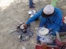 The chapati are then cooked on a curved pan over the open fire. It takes only 1-2 minutes to cook one.