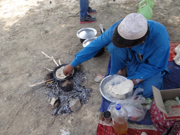 The chapati are then cooked on a curved pan over the open fire. It takes only 1-2 minutes to cook one.