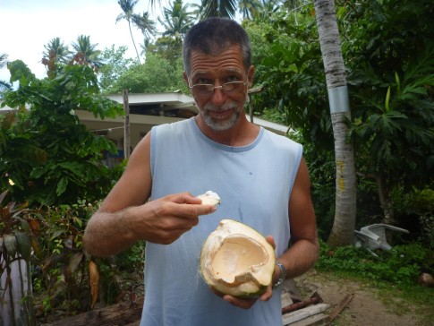 He then chopped the coconut in half, so that we could scrape out the gel like meat that was inside.