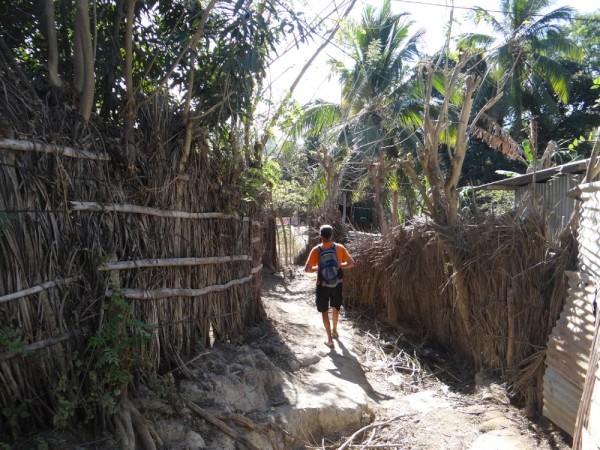 The streets are uneven, rough, dirt paths, which must turn into slippery, sloppy mud during rainy season.
