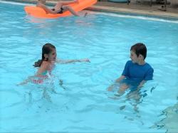 Owen and Brynn in the pool at Tween Waters Resort