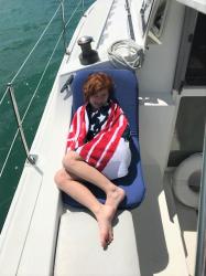 Kamryn relaxing during the day sail