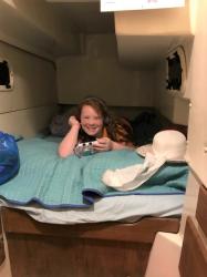 Kayla in her little berth which she loved, despite bumping her head several times