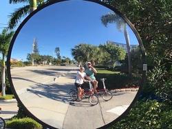 Selfie on bicycles in traffic mirror on FMB