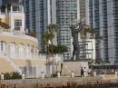 Man blowing conch statue in Miami water front