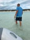 Pulling dinghy to the beach, to shallow to motor