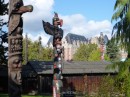 Totems with backside of Empress Hotel in background