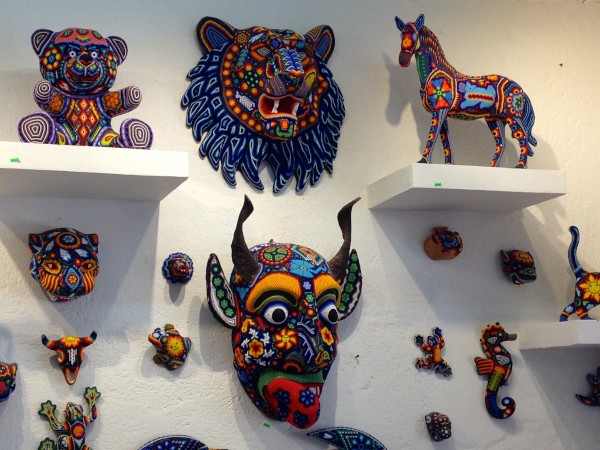 Huichol art, beads pressed into wax