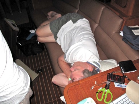 Dennis demonstrates his excellent technique of sleeping when ever however. While underway, we seldom removed clothes, and usually slept "ready to go".