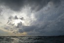 One moment sunshine, the next a foreboding sky and darkening sea. We sailed along in a kaleidoscope of ever changing panoramas. The rawness of nature evoked strong emotions: pure joy, naked fear. It was magnificent.