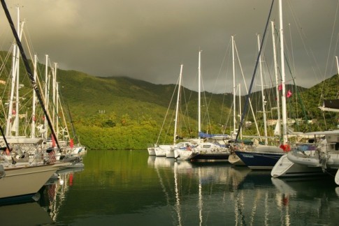 The muted colors of a classic BVI dawn fall upon quiet waters in the Nanny Cay Marina.