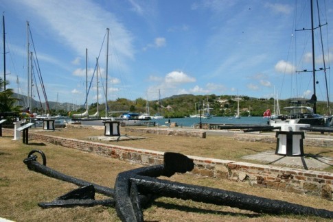 Shot of an old anchor on the grounds surrounding English Harbor on Antigua. It