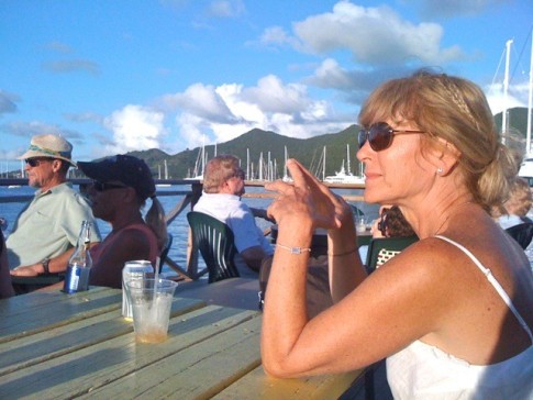 We join the locals at the Simpson Bay Yacht Club to drink some  50 cent beer and watch the yachts parade into the lagoon during the evening bridge opening. Well, I