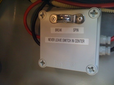 Our wind generator control is installed in a custom water tight box below deck in the aft starboard lazerette. "BREAK" is misspelled. It should be "BRAKE", which is a position that prevents the generator from spinning at high speeds.