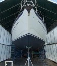 Pretty new hull - look at that shine! - with marine blue contrast stripes and blue bottom paint.