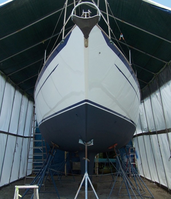 Pretty new hull - look at that shine! - with marine blue contrast stripes and blue bottom paint.