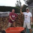 Woodsmen: Tom and Larry working on their annual firewood stacking project.