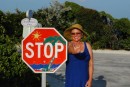 Colorful Bahamian stop sign on a hike to the ocean side of Highbourne Cay.